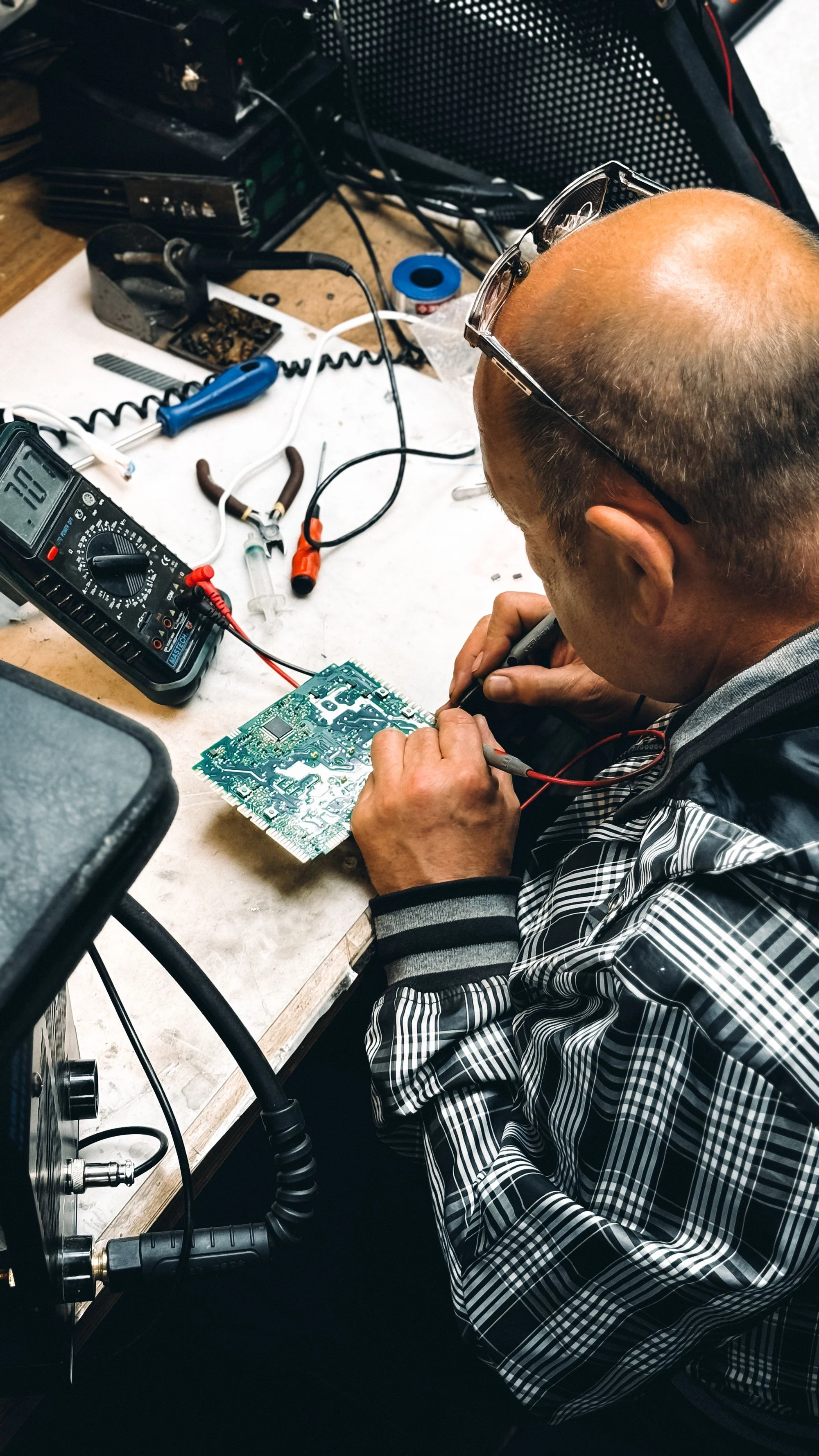 Industry context: electronic circuit inspection with a meter